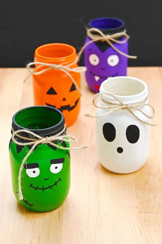 Halloween painted mason jars for festive decorations and DIY projects