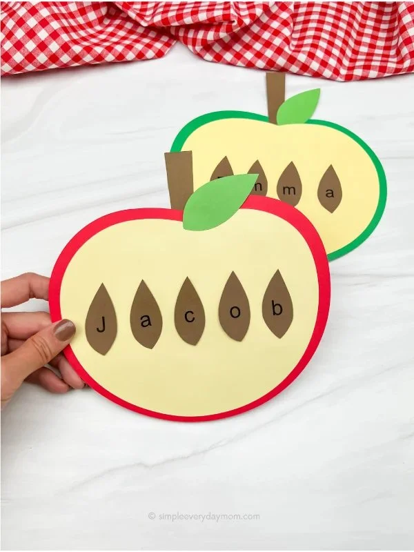 Kids engaging in Apple Name Craft activity with free template.