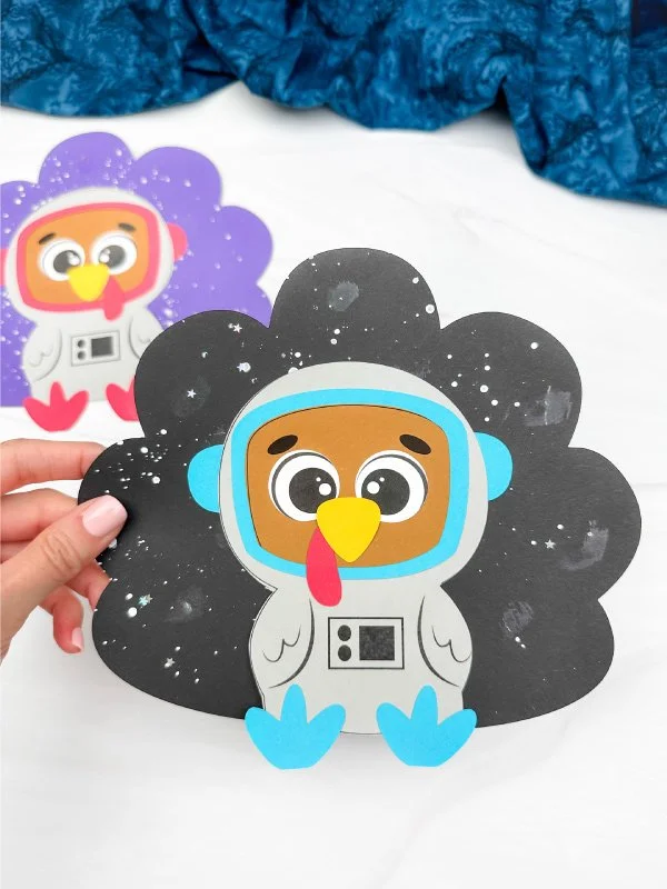 Kids' astronaut turkey disguise craft template for fun learning activities.