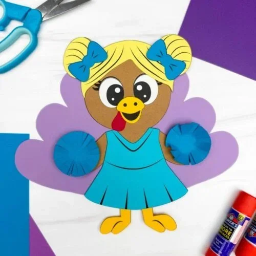 Cheerleader Turkey Disguise Craft with free printable template for kids.