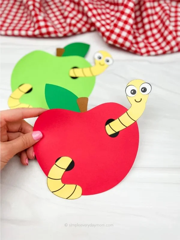 Cute worm craft in an apple using free template for kids