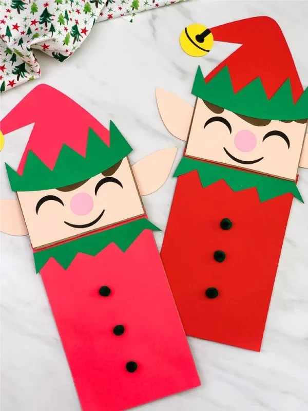 Child making an Elf Paper Bag Craft with template